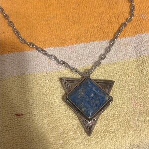 Handmade and signed by the artist, turquoise and silver triangle pendant signed